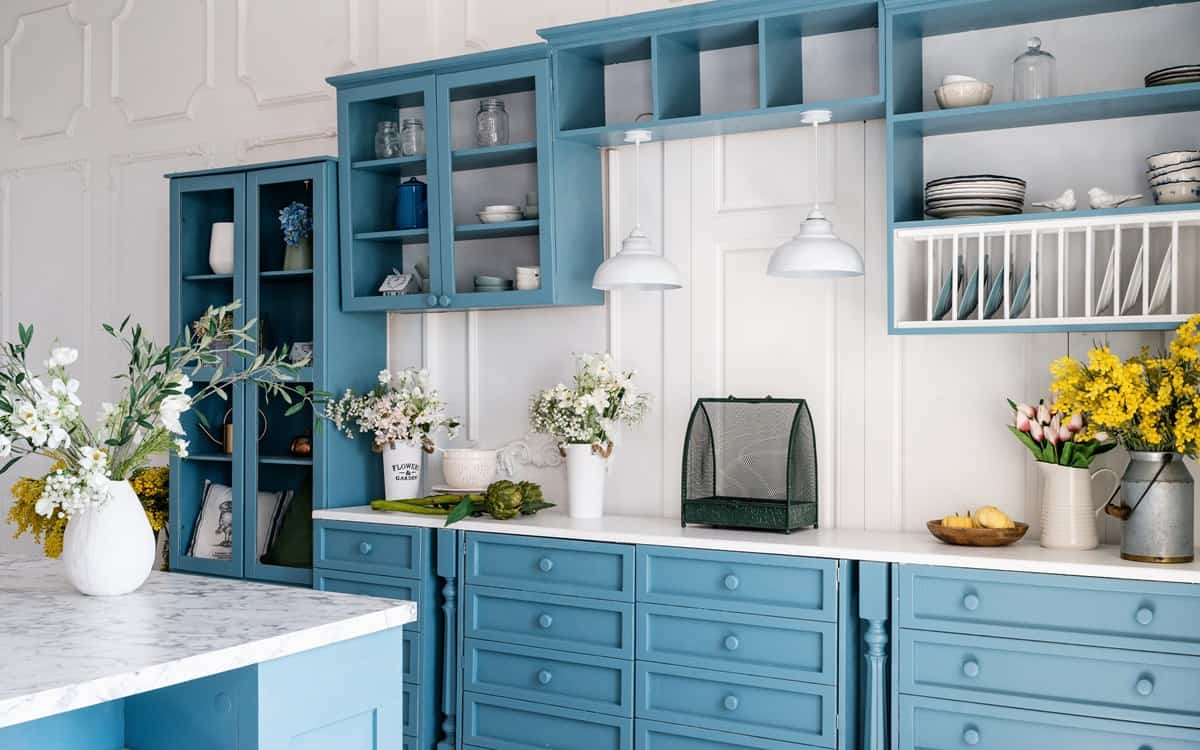 white walls and blue cabinets